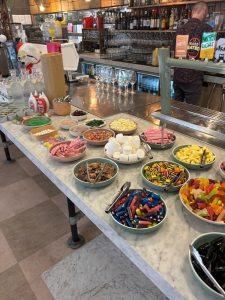 Bowls of colourful lollies and decorations ready for the gingerbread workshop