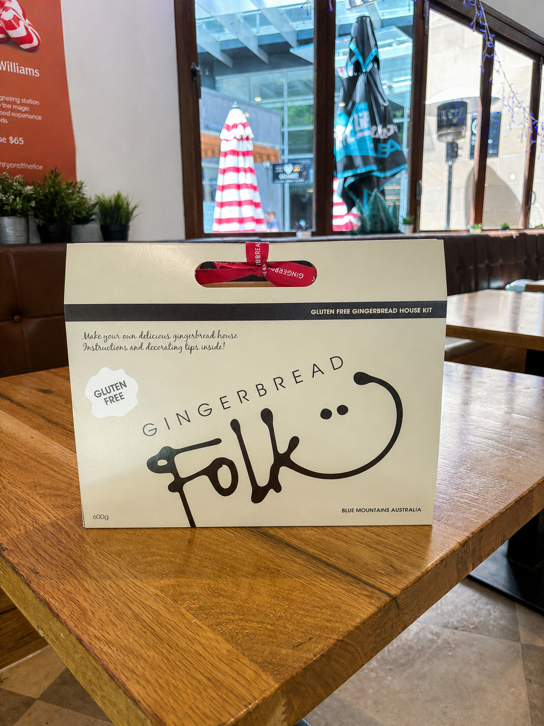 A boxed gingerbread house kit ready for the workshop
